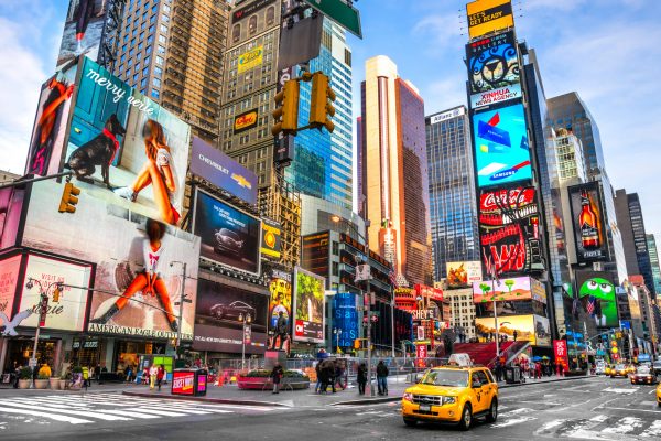 NEW YORK CITY - DEC 01 Times Square ,is a busy tourist intersection of neon art and commerce and is an iconic street of New York City and America, December 01th, 2013 in Manhattan, New York City.